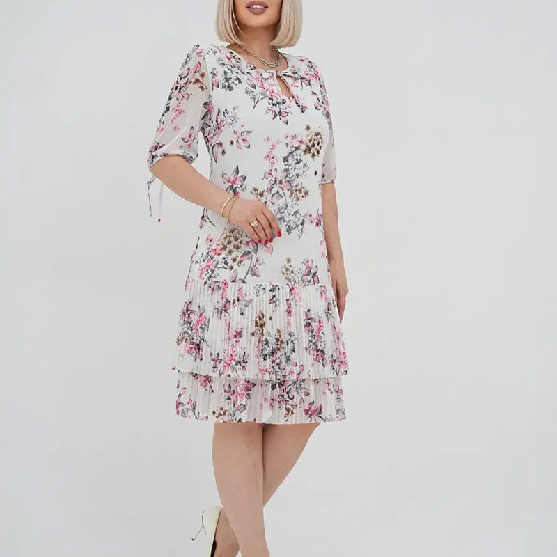 đ„đElegĂĄns sifon hosszĂș pliszĂrozott ruha rövid ujjakkal