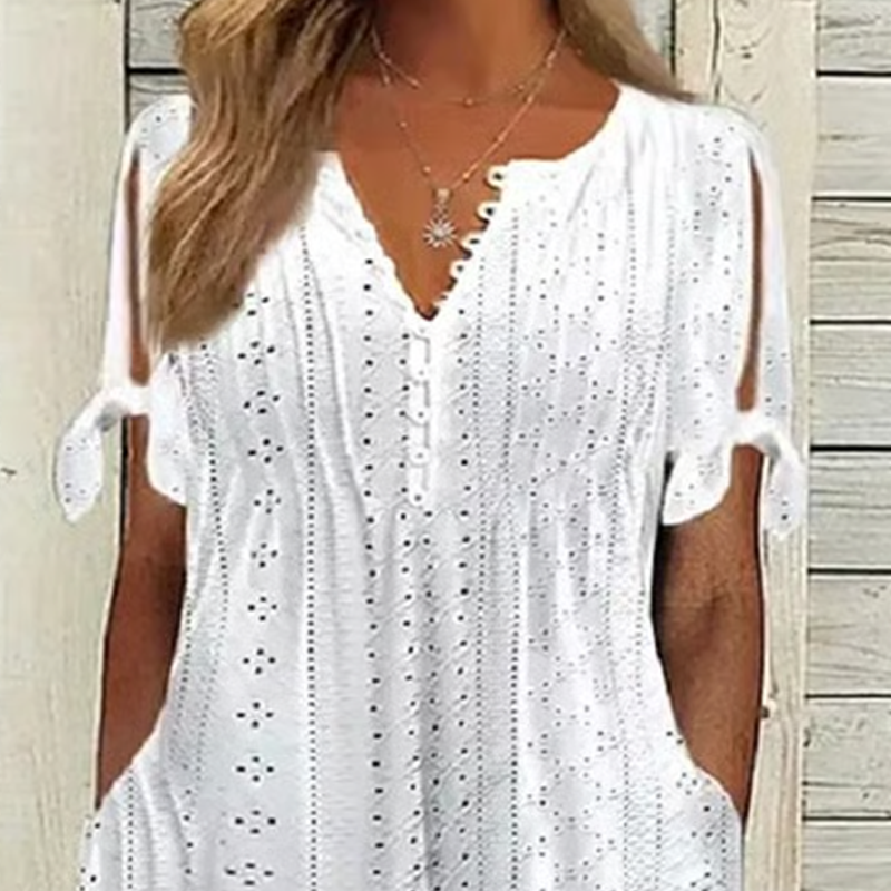 đ„đNĆi elegĂĄns V-nyakĂș ĂŒreges egyszĂnƱ ruha