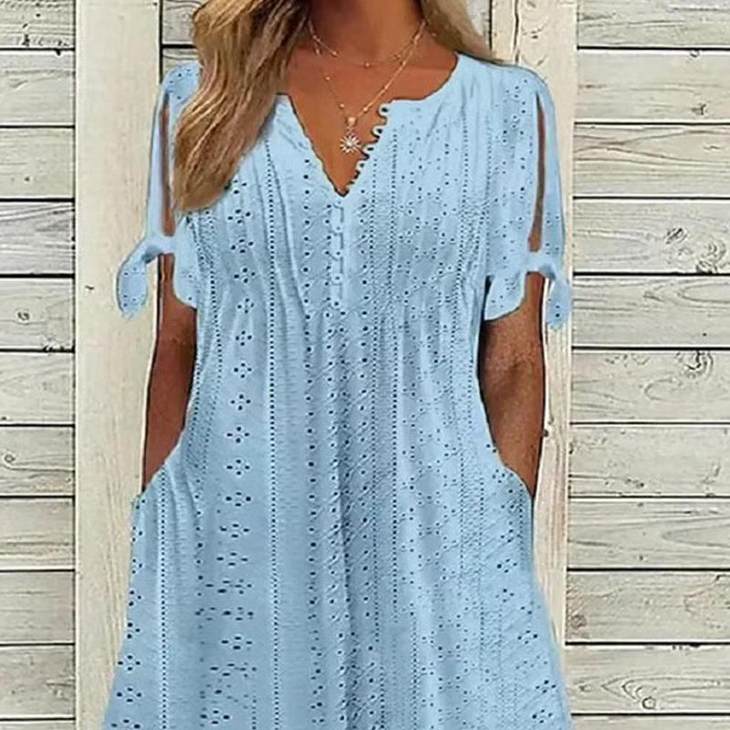 đ„đNĆi elegĂĄns V-nyakĂș ĂŒreges egyszĂnƱ ruha