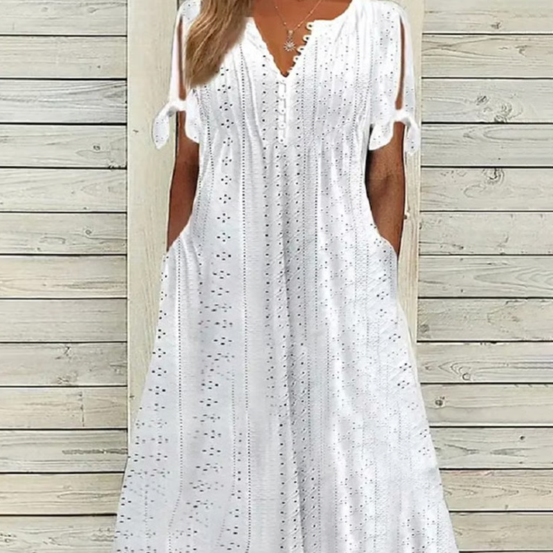 đ„đNĆi elegĂĄns V-nyakĂș ĂŒreges egyszĂnƱ ruha