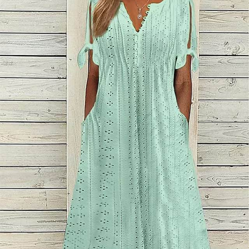 đ„đNĆi elegĂĄns V-nyakĂș ĂŒreges egyszĂnƱ ruha